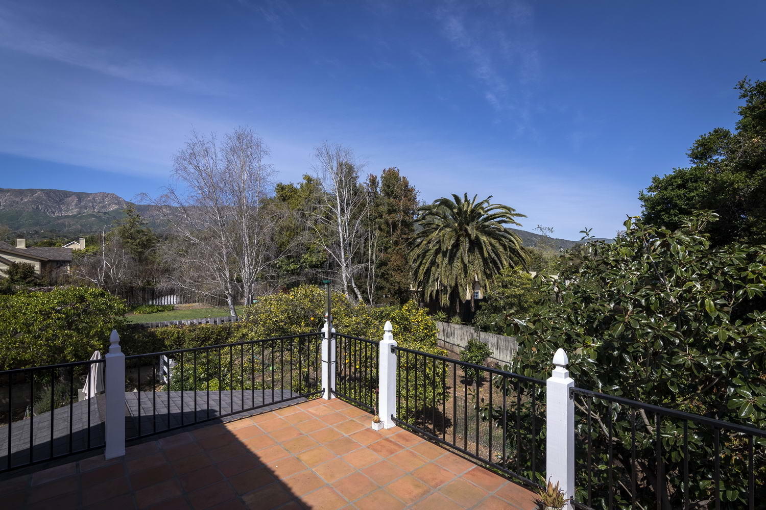 166 Toro Canyon Road Carpinteria, CA 93013 - Photo 4 of 11 a view of a balcony with wooden fence