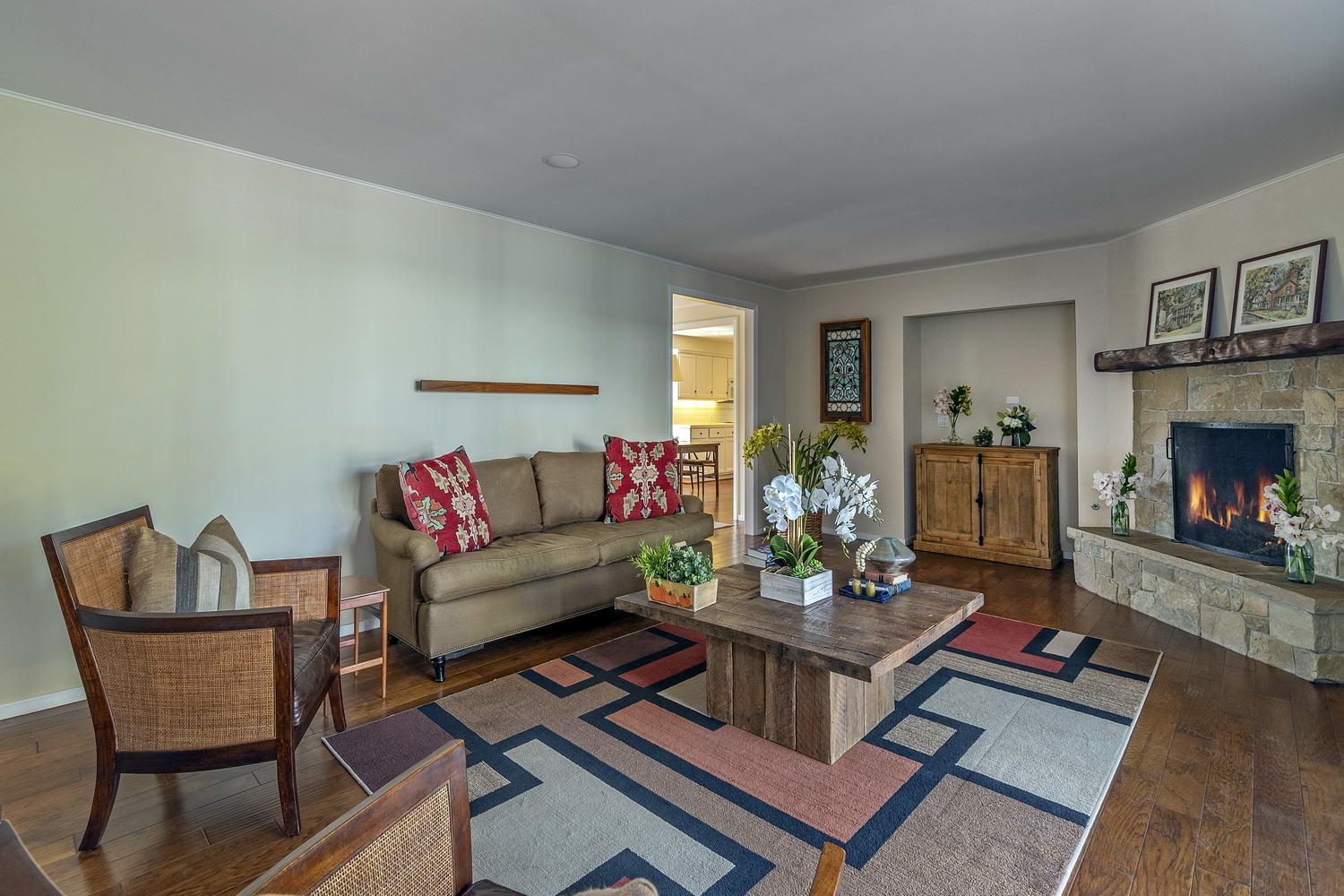 166 Toro Canyon Road Carpinteria, CA 93013 - Photo 5 of 11 a living room with furniture and a fireplace