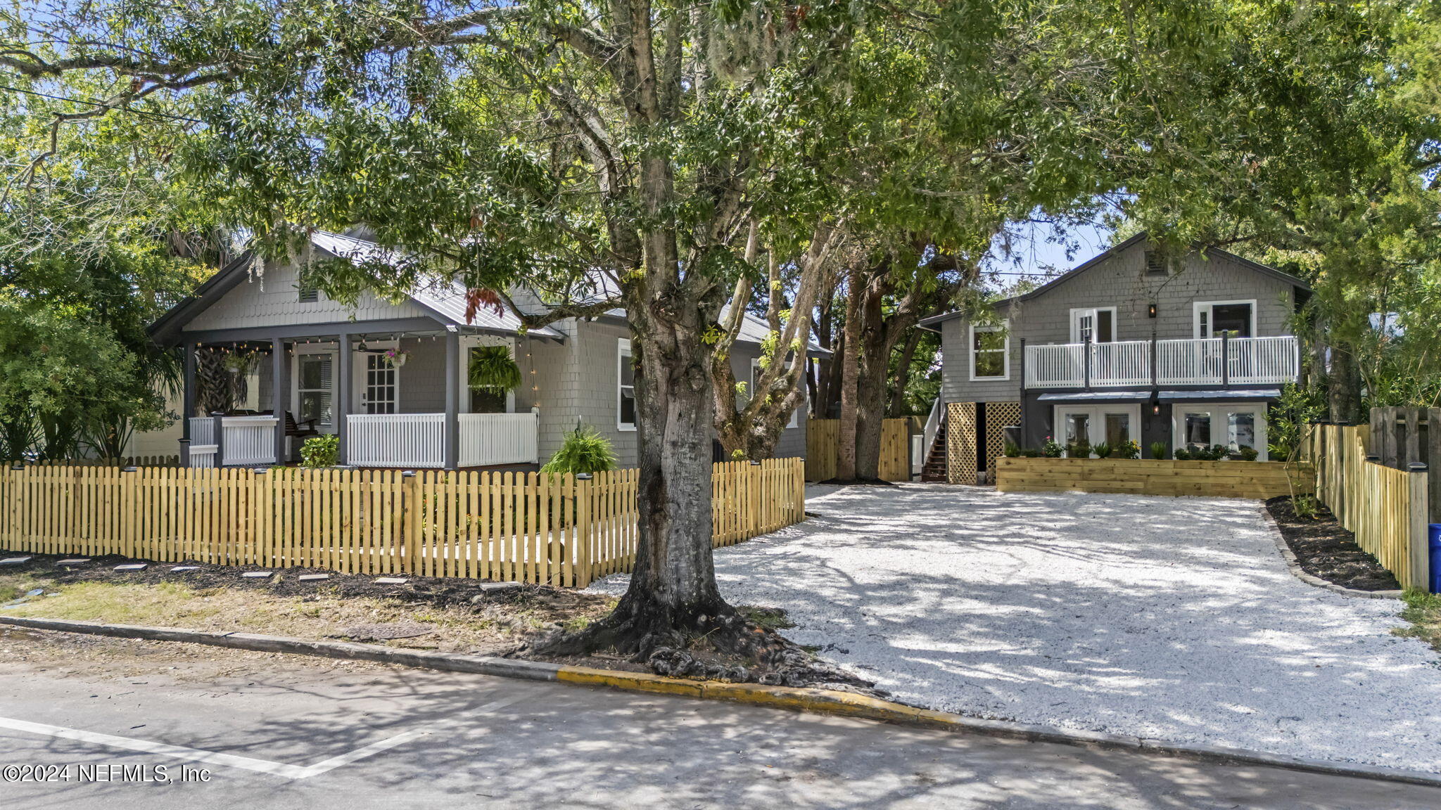 64 Carrera Street St. Augustine, FL 32084 - Photo 1 of 84 a front view of a house with a garden