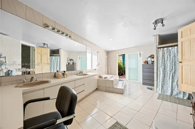 a view of a swimming pool with a patio