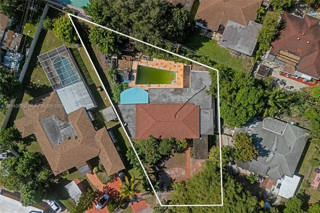 an aerial view of house with outdoor space