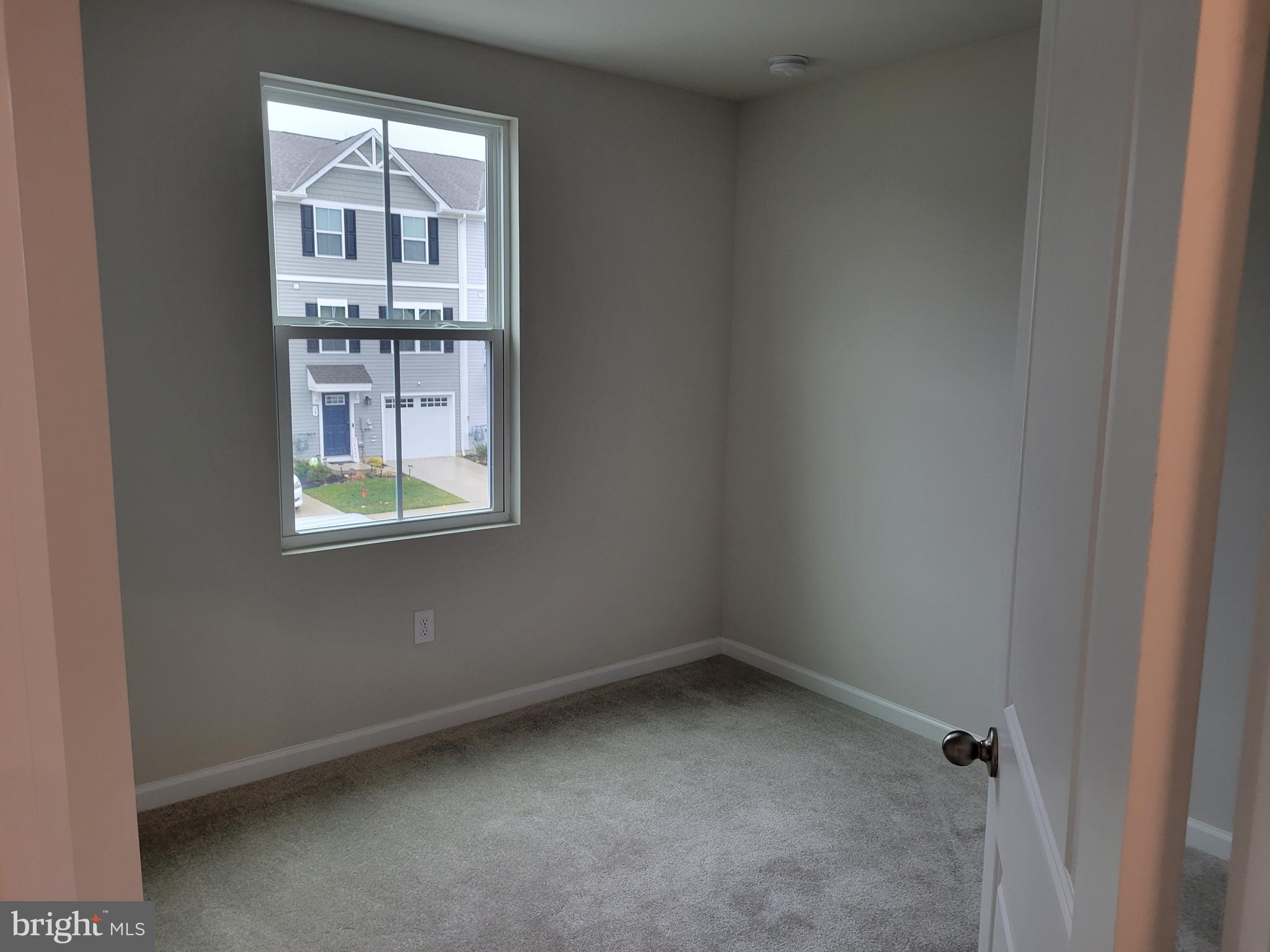 24 Mulberry Lane Clementon, NJ 08021 - Photo 11 of 13 a view of an empty room with a window