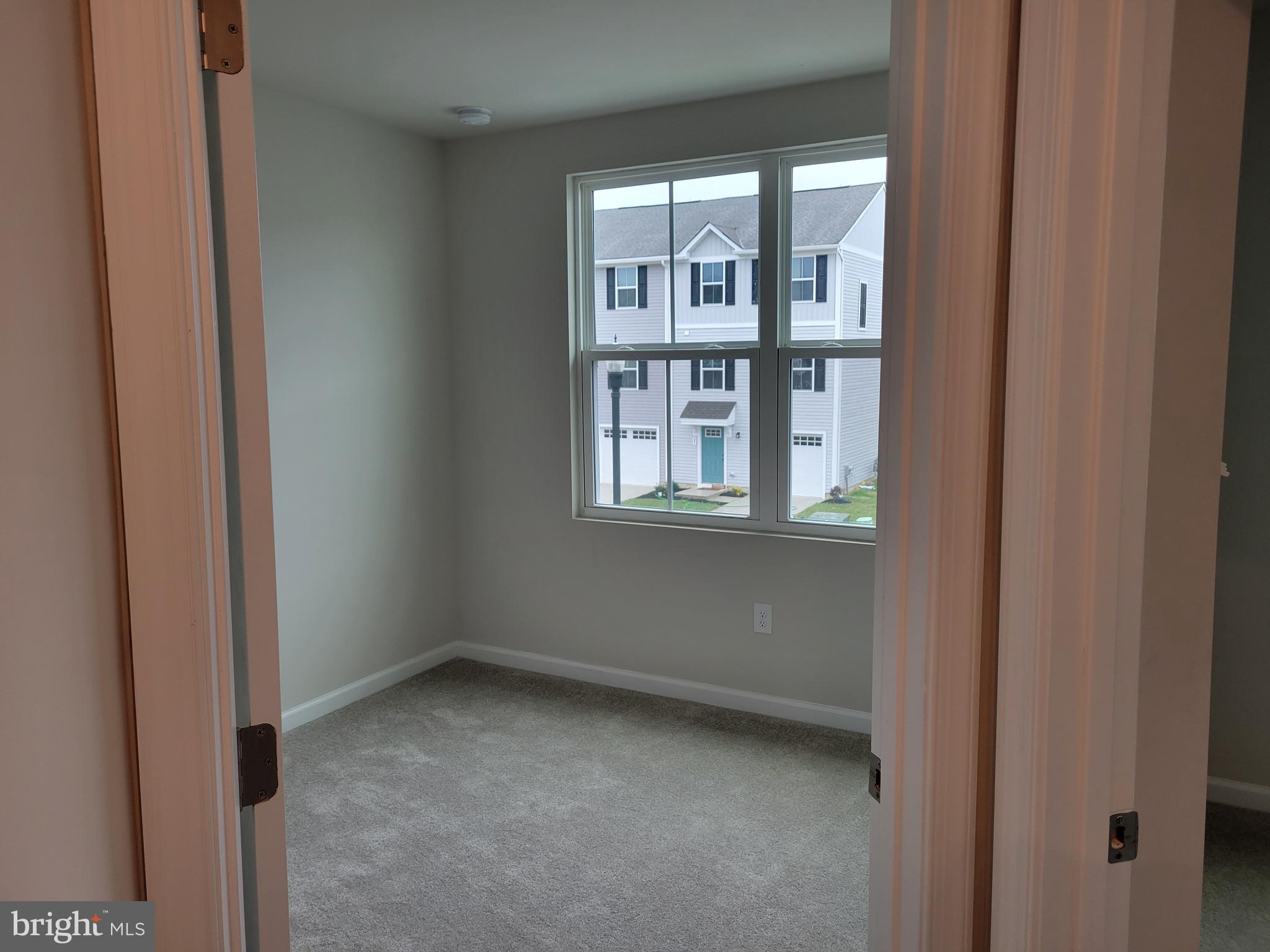 24 Mulberry Lane Clementon, NJ 08021 - Photo 12 of 13 a view of an empty room with a window