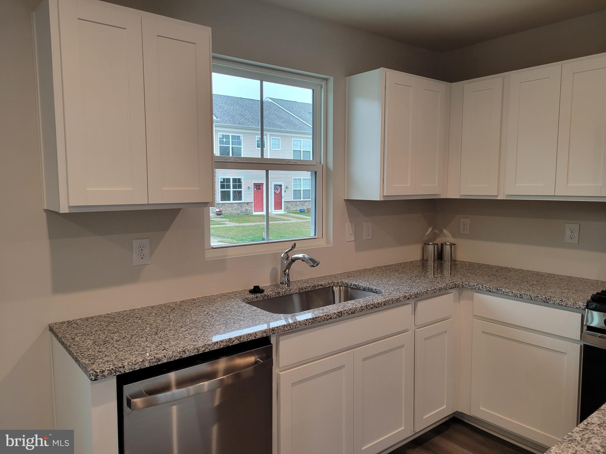 24 Mulberry Lane Clementon, NJ 08021 - Photo 3 of 13 a kitchen with sink cabinets and window