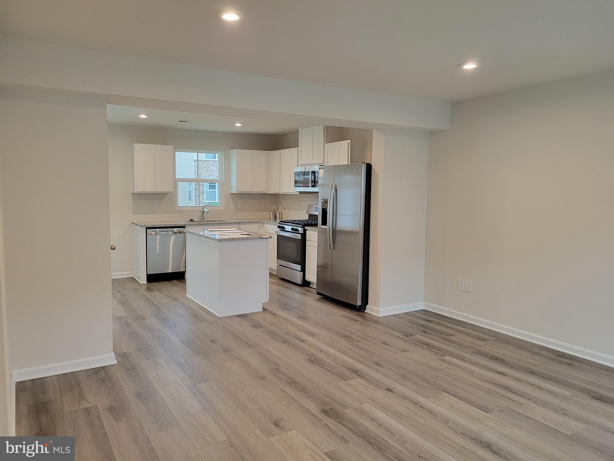 24 Mulberry Lane Clementon, NJ 08021 - Photo 4 of 13 a kitchen with stainless steel appliances a refrigerator sink and microwave