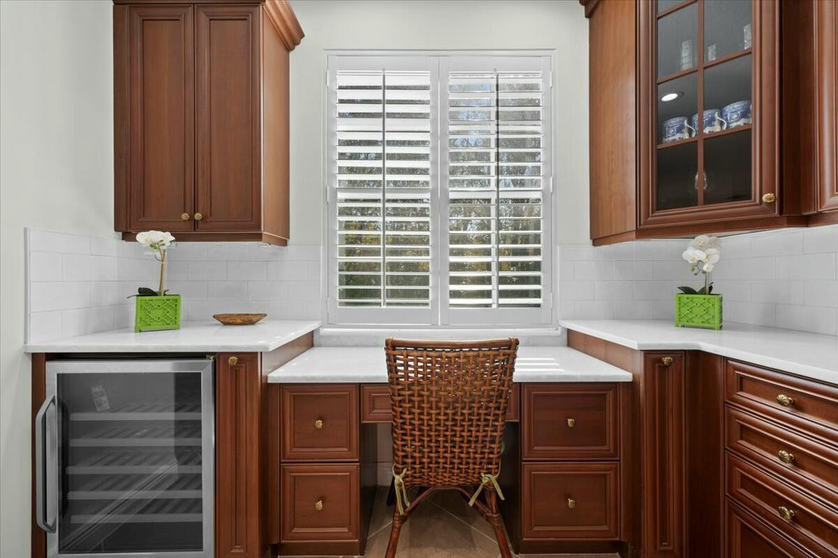 222 Tresana Boulevard, Unit 44 Jupiter, FL 33478 - Photo 14 of 63 a bathroom with a sink and a window