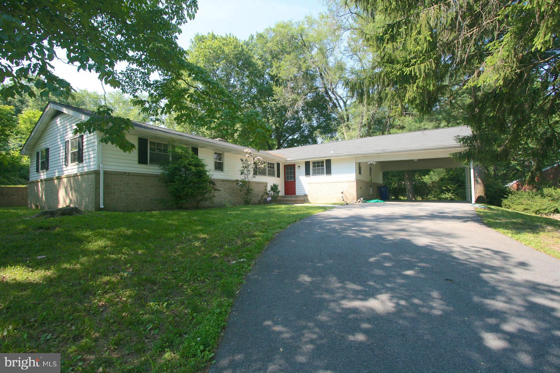9429 Dartmouth Road Columbia, MD 21045 - Photo 1 of 27 a view of house that has a yard