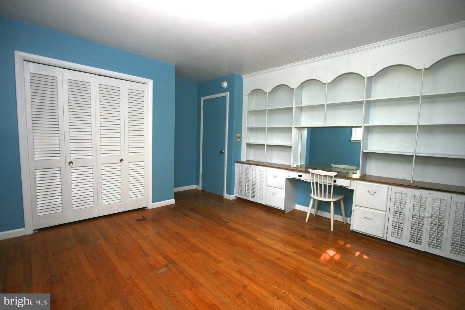 9429 Dartmouth Road Columbia, MD 21045 - Photo 15 of 27 a view of a workspace with furniture and wooden floor