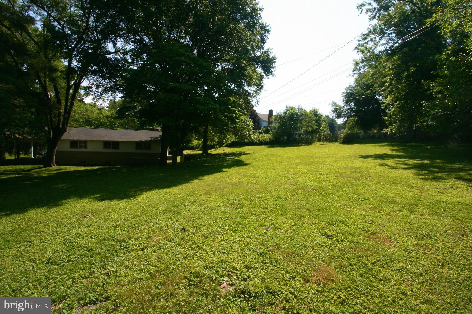 9429 Dartmouth Road Columbia, MD 21045 - Photo 20 of 27 a view of a lake with a yard