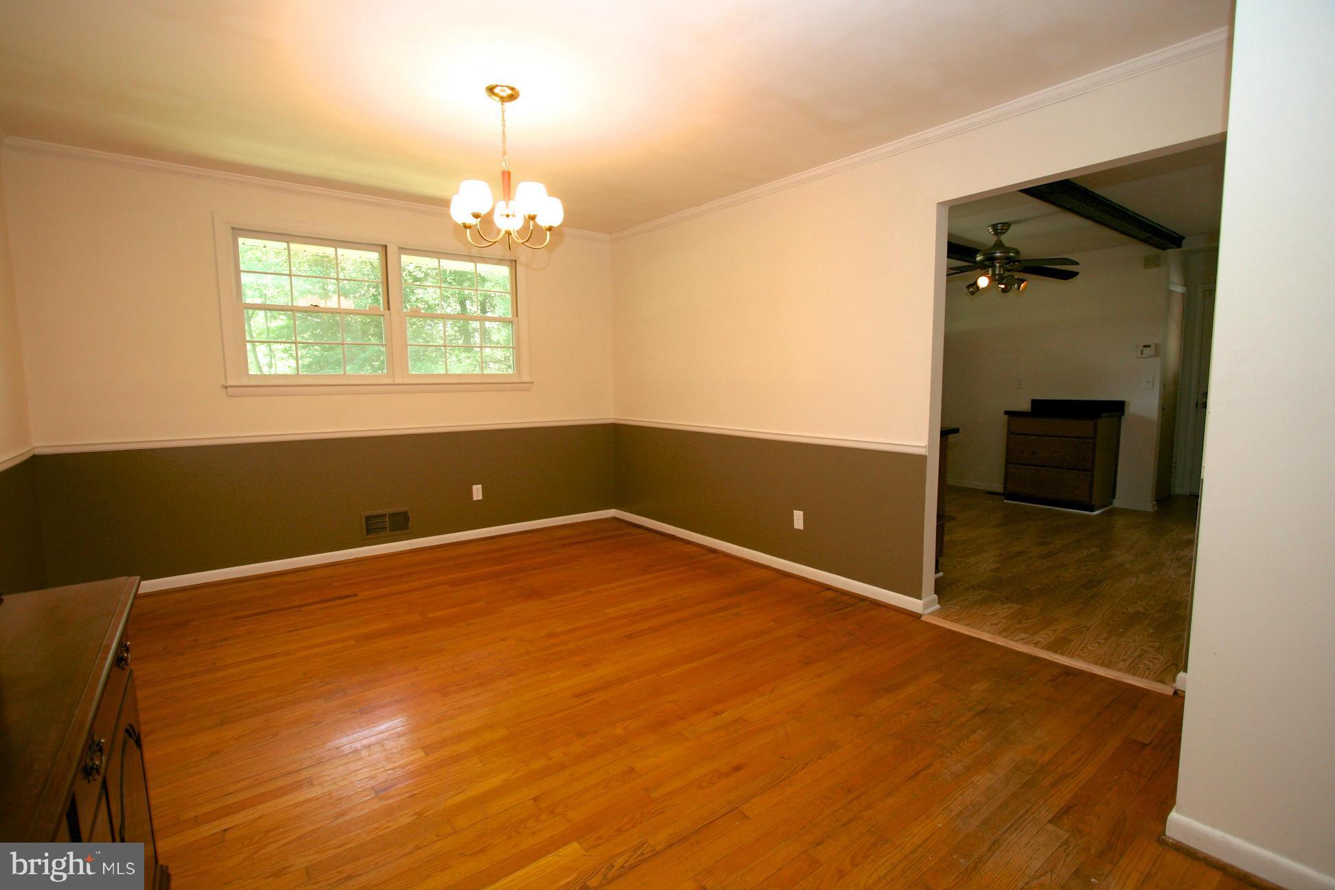 9429 Dartmouth Road Columbia, MD 21045 - Photo 9 of 27 an empty room with windows and outdoor view