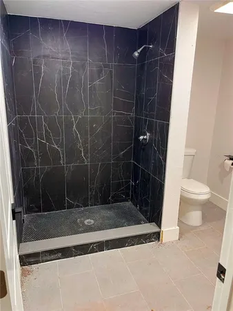 a swimming pool with outdoor seating and yard