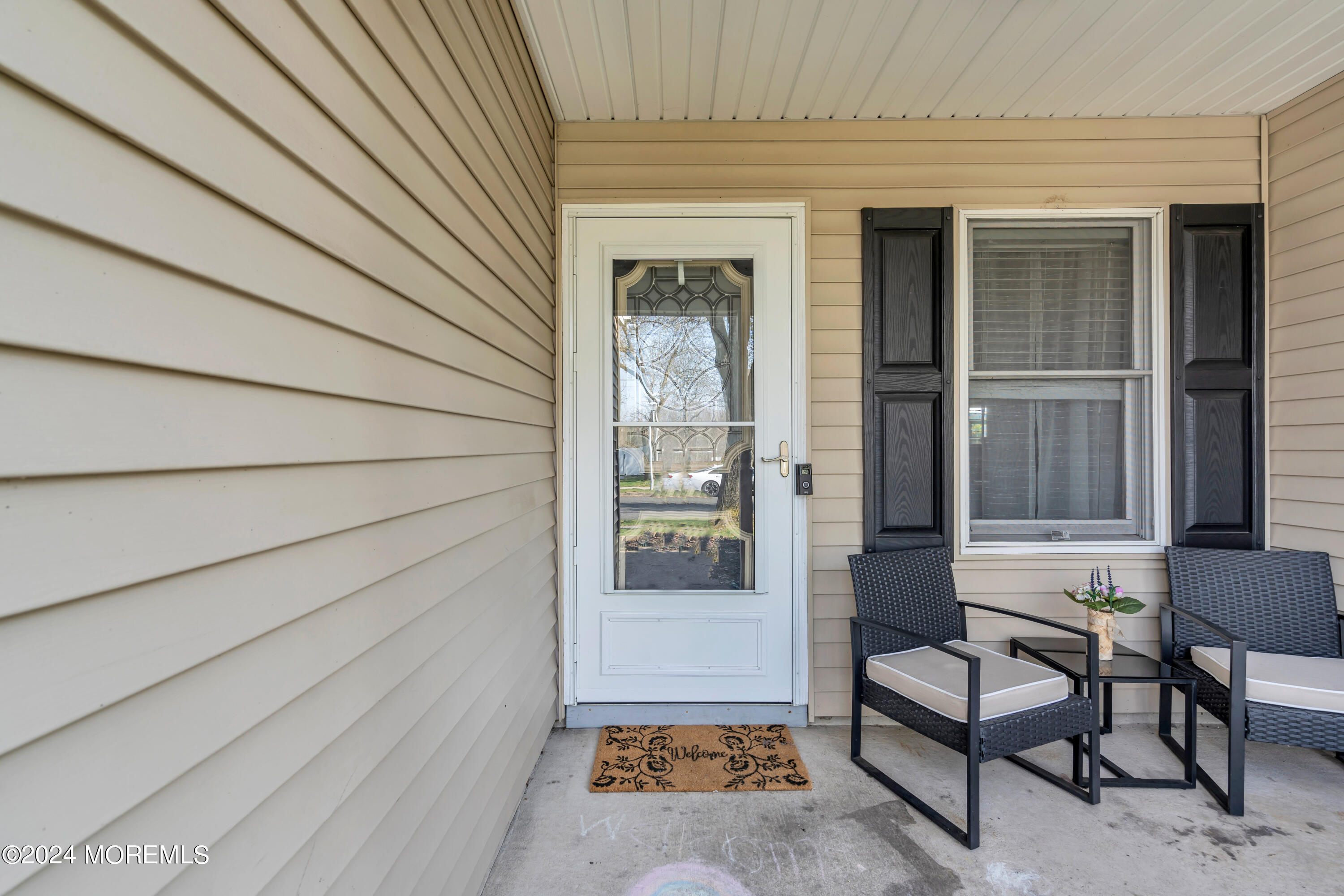 38 Concord Circle Howell, NJ 07731 - Photo 19 of 38 a view of front door and outdoor seating