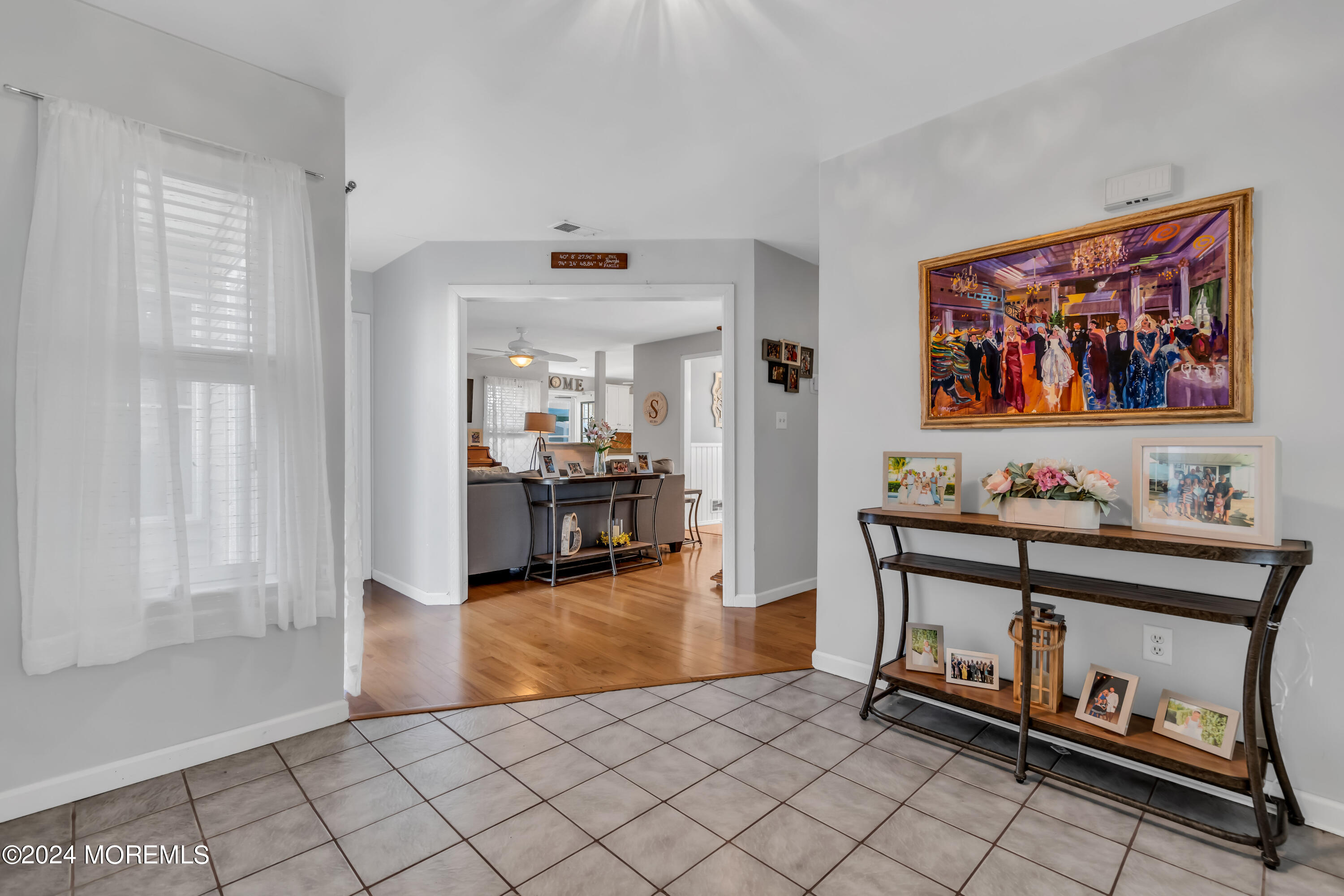 38 Concord Circle Howell, NJ 07731 - Photo 21 of 38 a view of a room with furniture and lots of painting on the wall