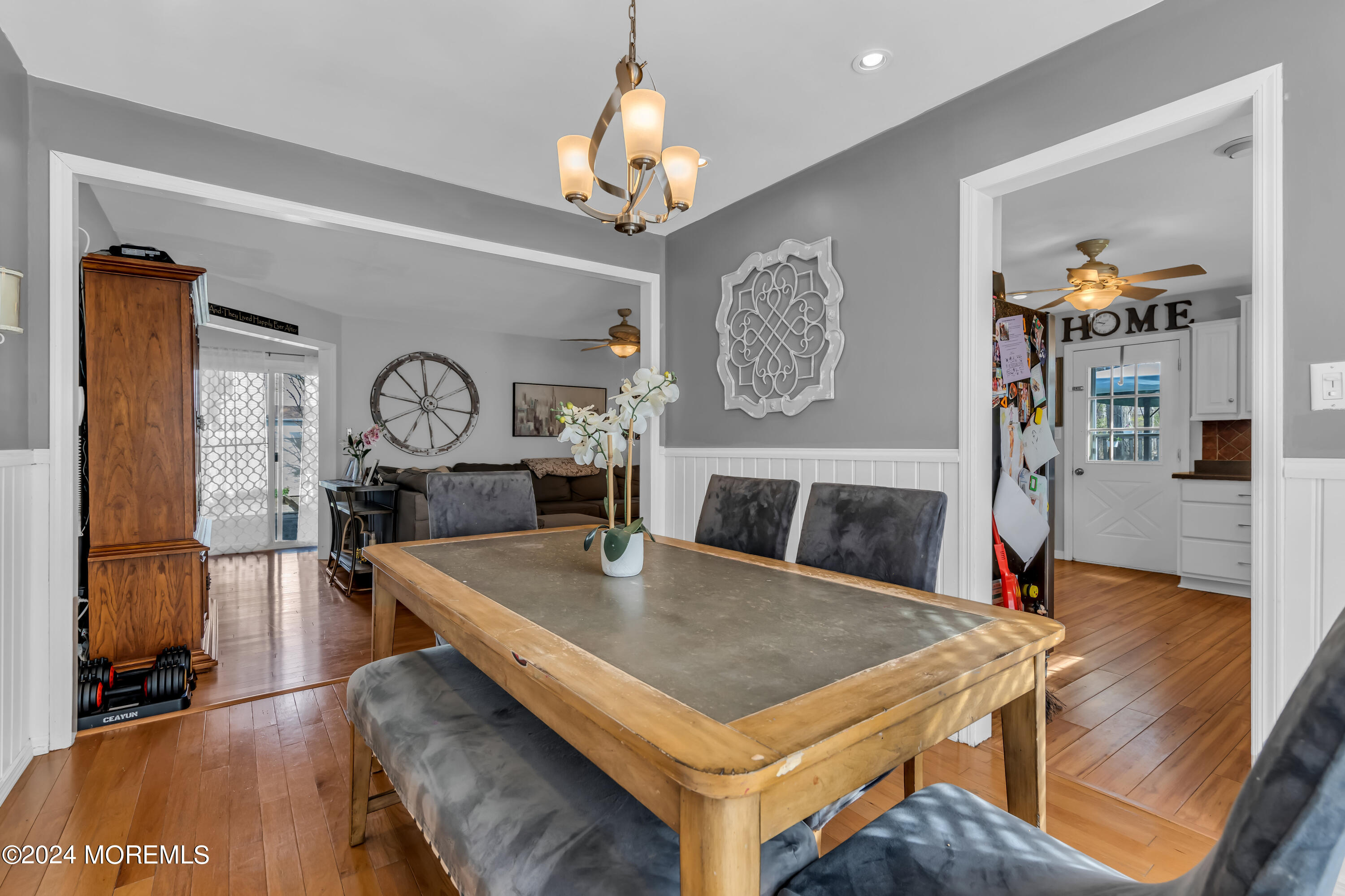38 Concord Circle Howell, NJ 07731 - Photo 26 of 38 a living room with dining table and wooden floor