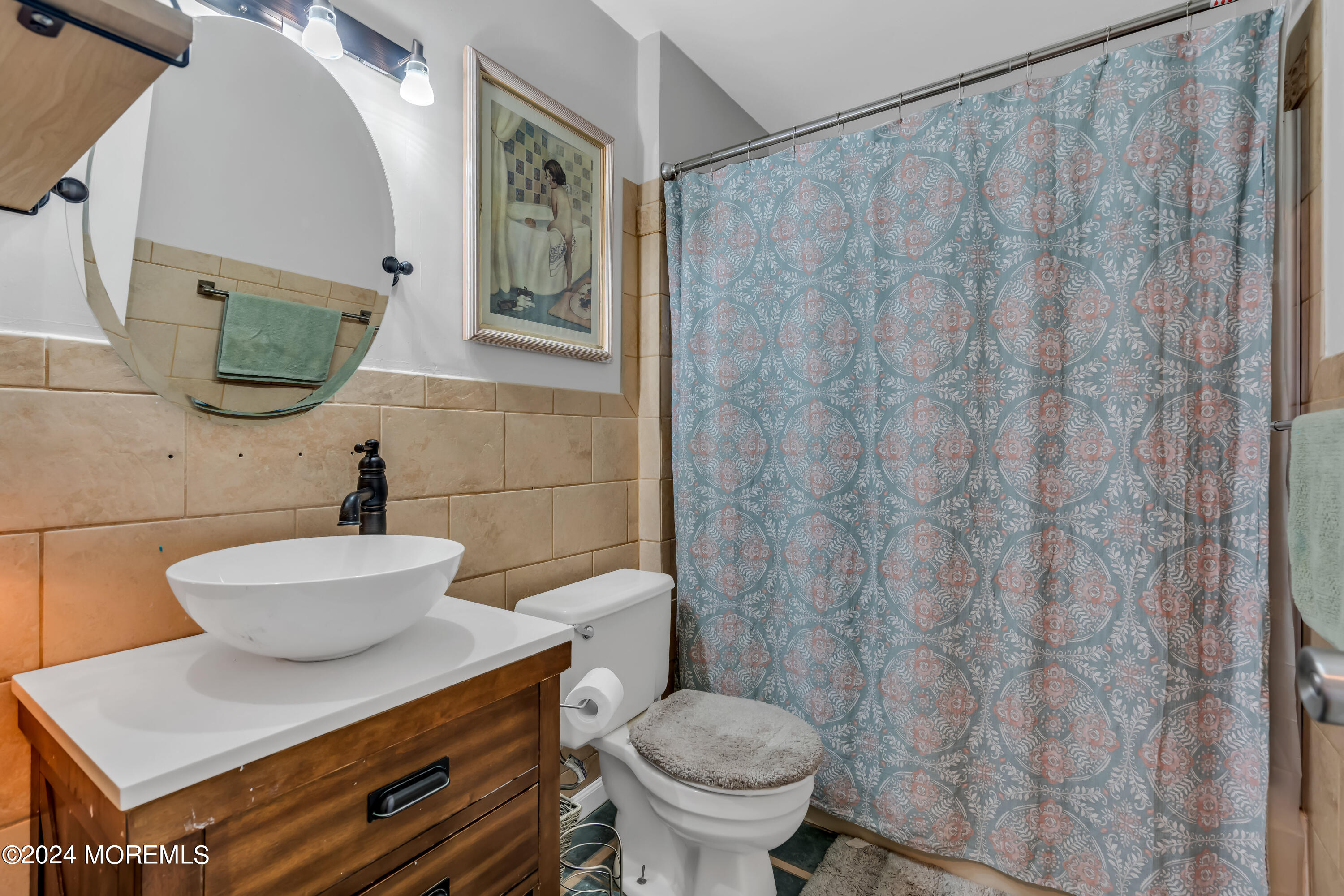 38 Concord Circle Howell, NJ 07731 - Photo 28 of 38 a bathroom with a sink a toilet and a mirror