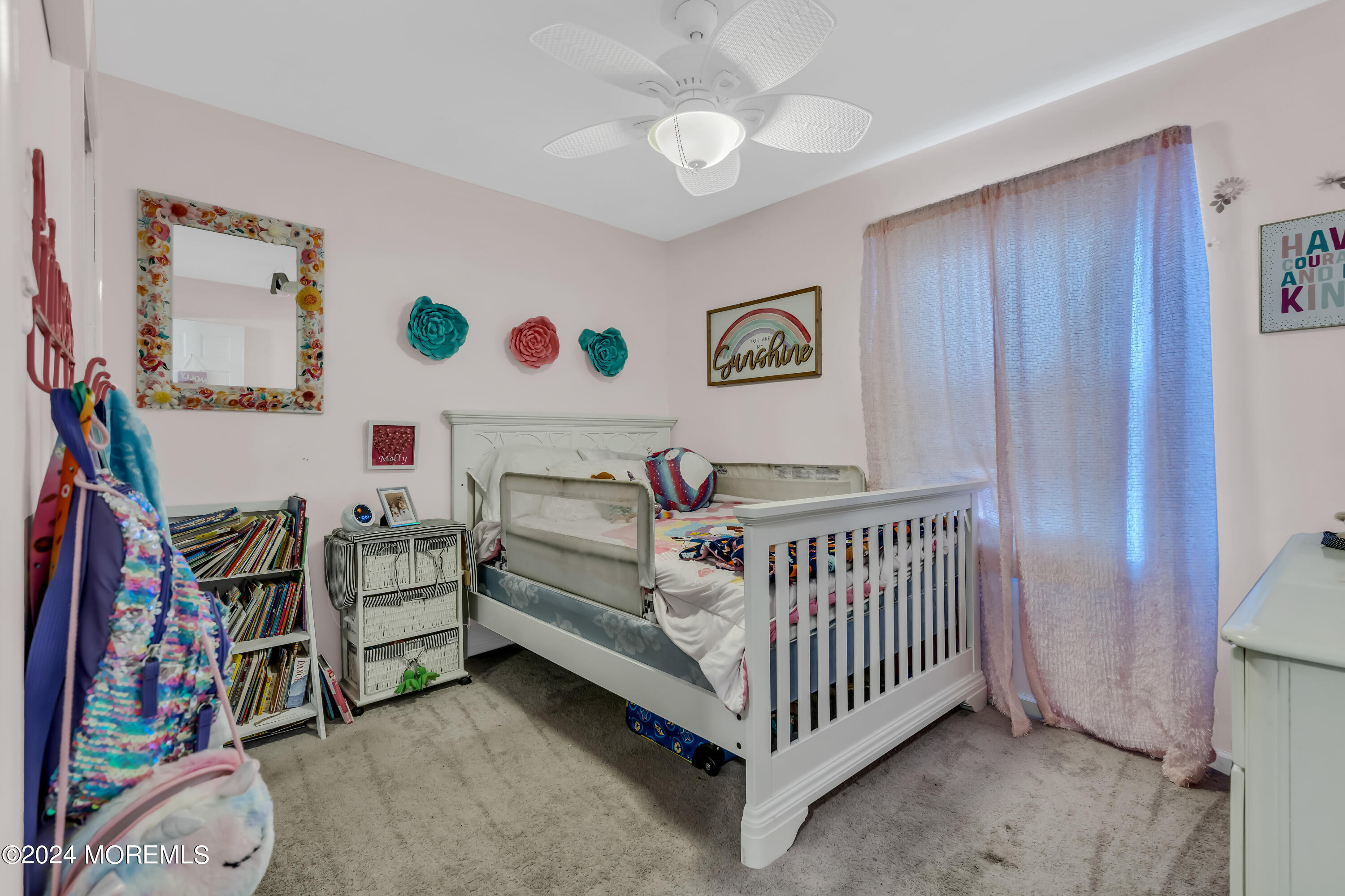 38 Concord Circle Howell, NJ 07731 - Photo 29 of 38 a bedroom with furniture and a chandelier