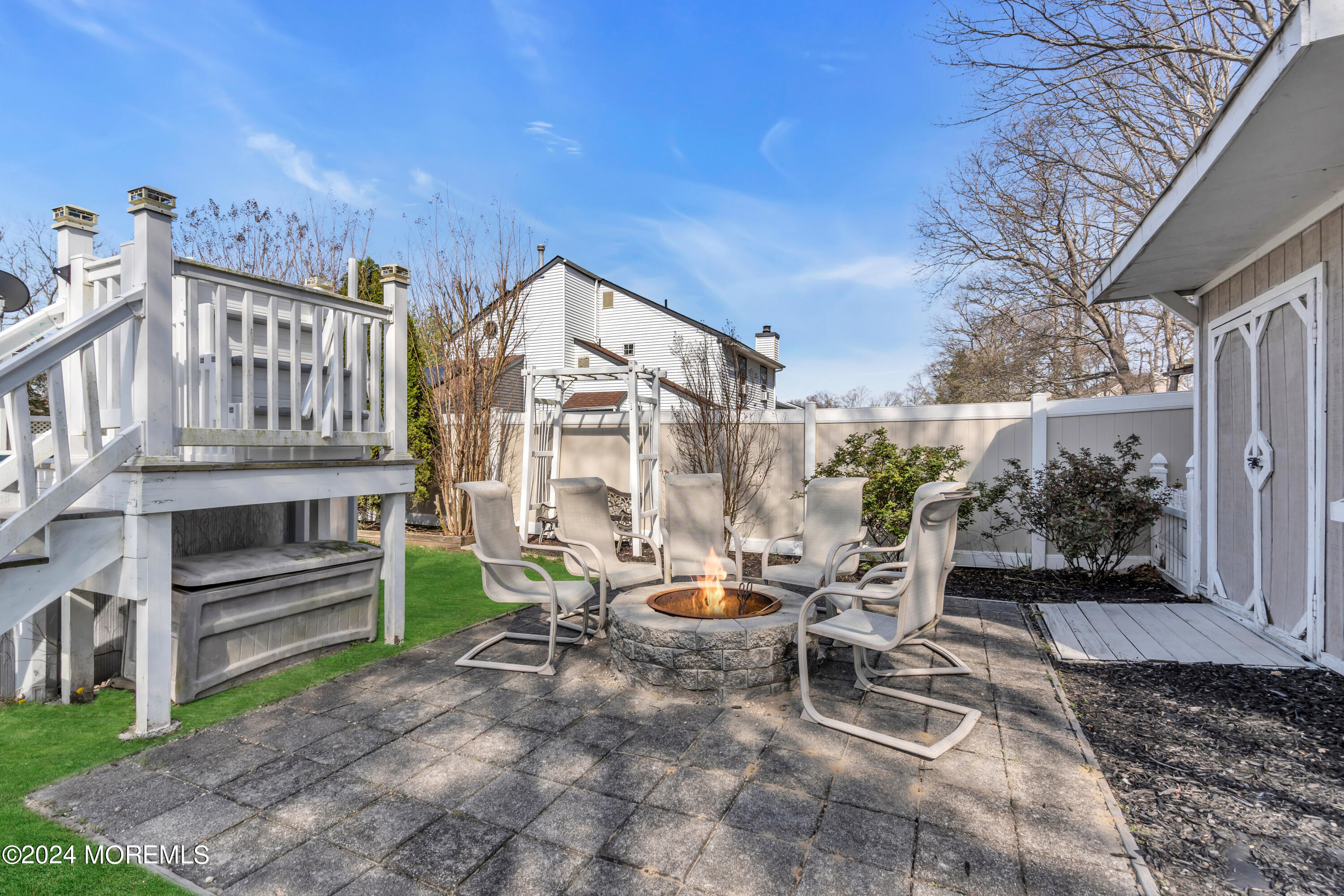 38 Concord Circle Howell, NJ 07731 - Photo 31 of 38 a view of a patio with a table and chairs