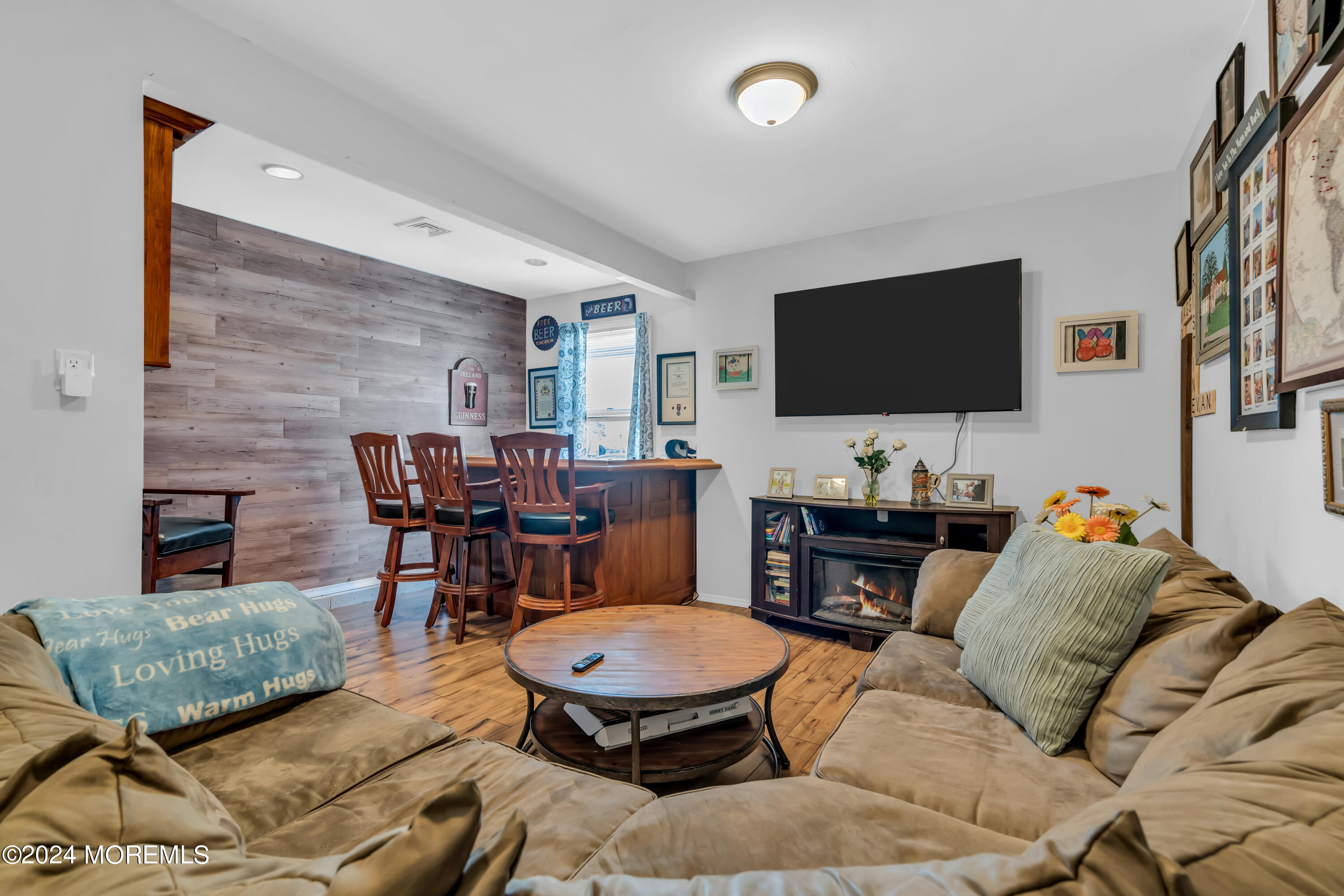 38 Concord Circle Howell, NJ 07731 - Photo 5 of 38 a living room with furniture and a flat screen tv