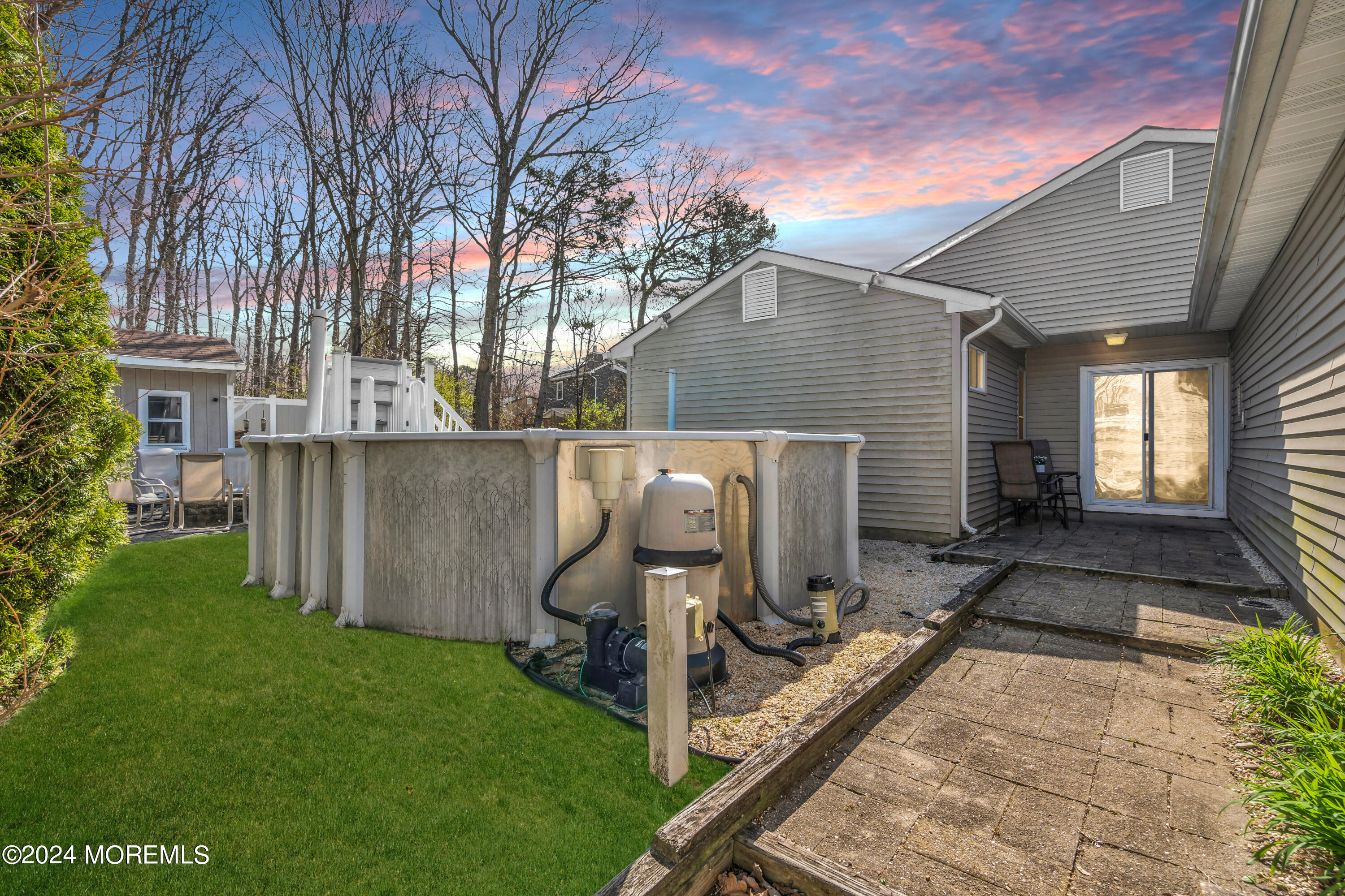 38 Concord Circle Howell, NJ 07731 - Photo 8 of 38 a view of a backyard with sitting area and tree