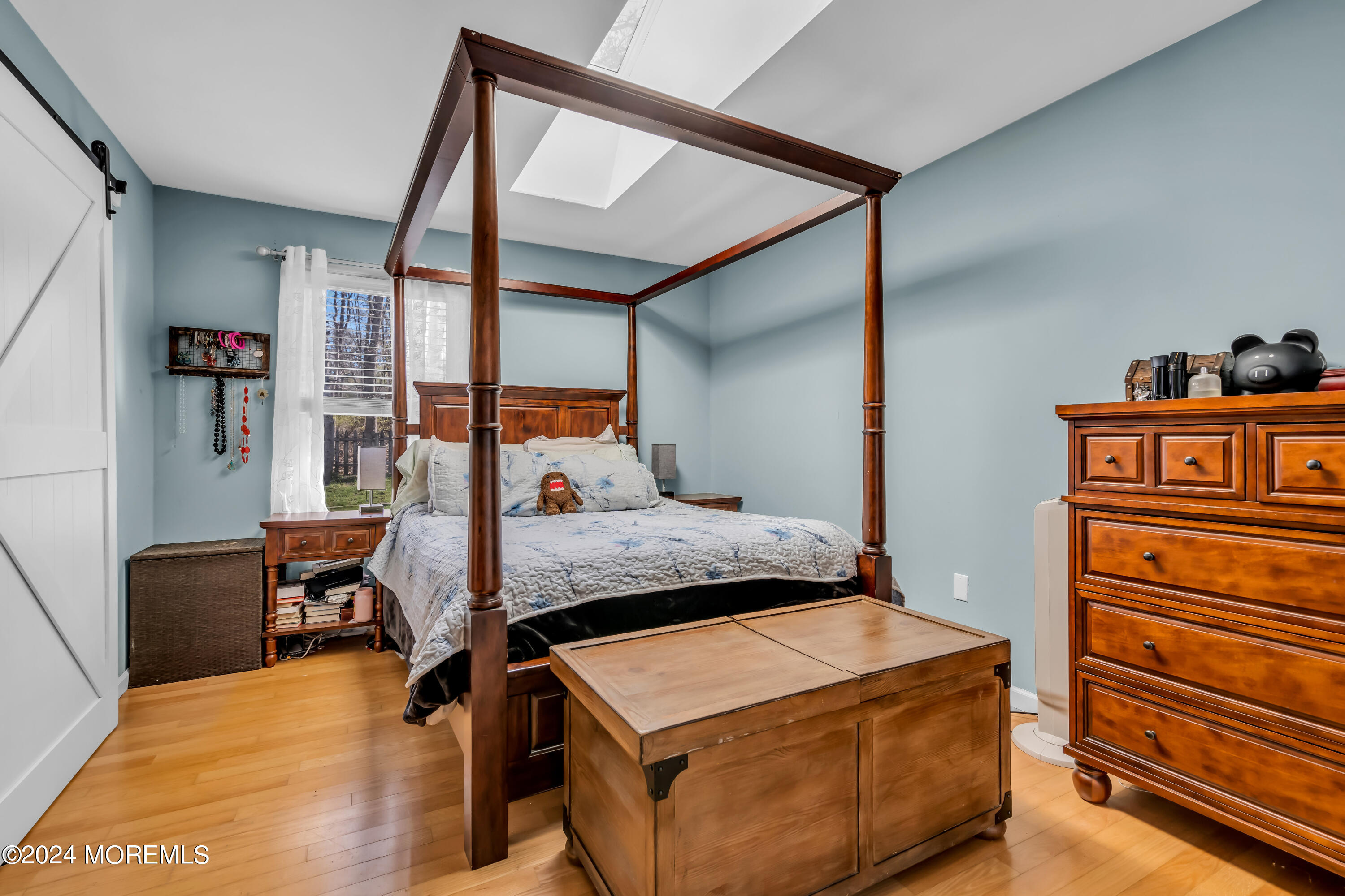 38 Concord Circle Howell, NJ 07731 - Photo 9 of 38 a bedroom with a bed and wooden floor