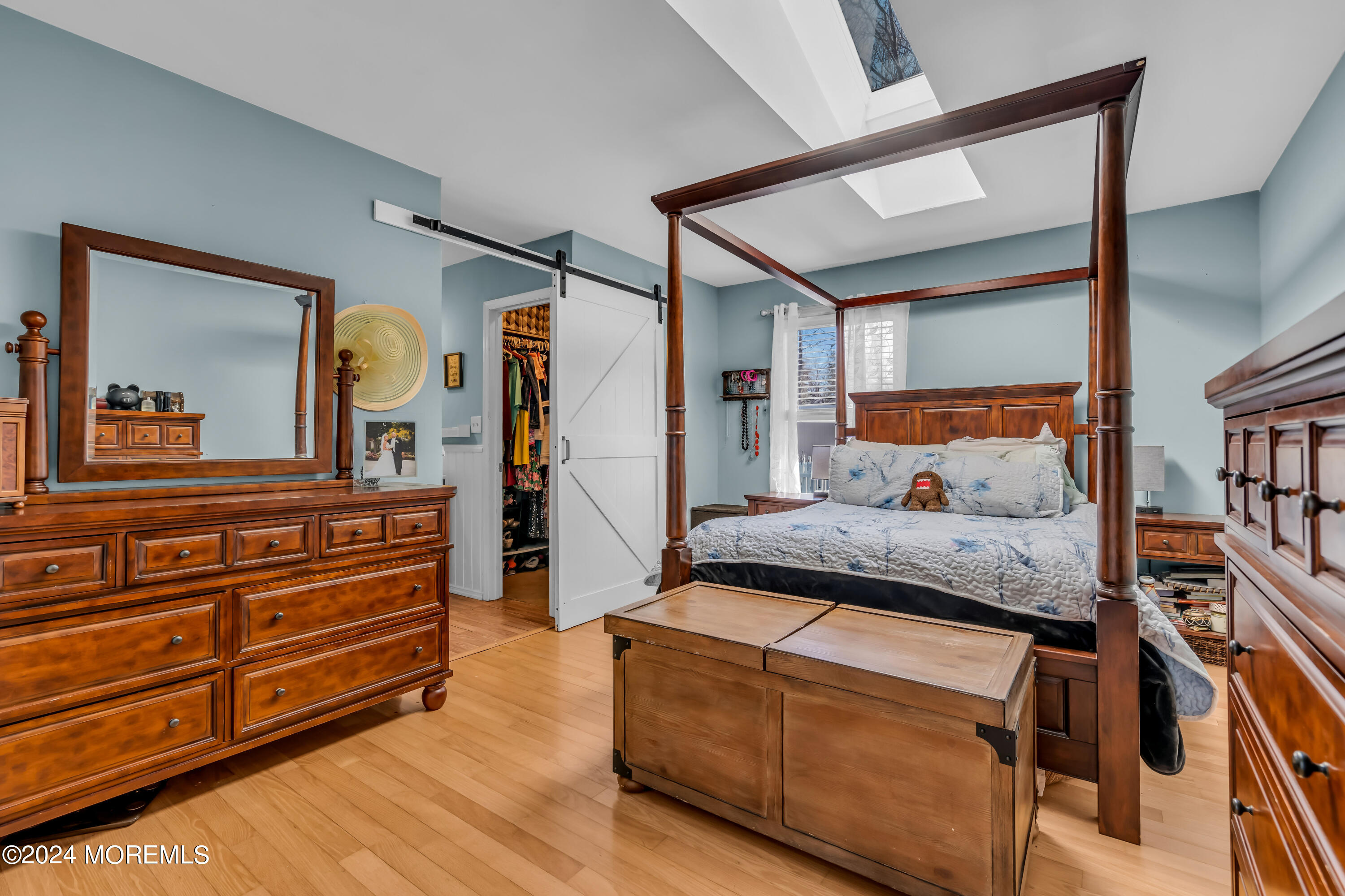 38 Concord Circle Howell, NJ 07731 - Photo 10 of 38 a bedroom with a bed and a large mirror on the dresser