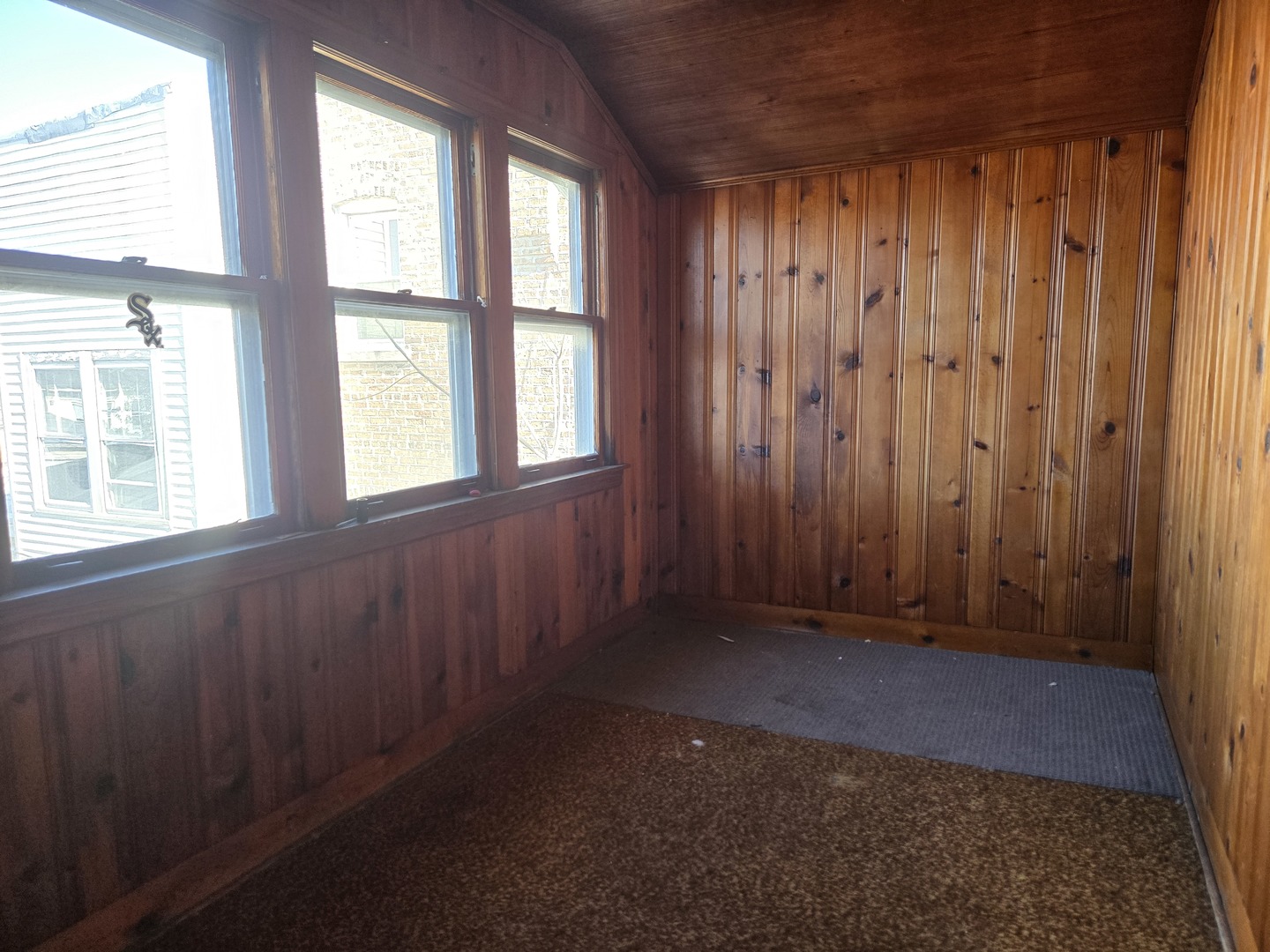 5204 West Newport Avenue, Unit 2 Chicago, IL 60641 - Photo 10 of 10 a view of an empty room with a window