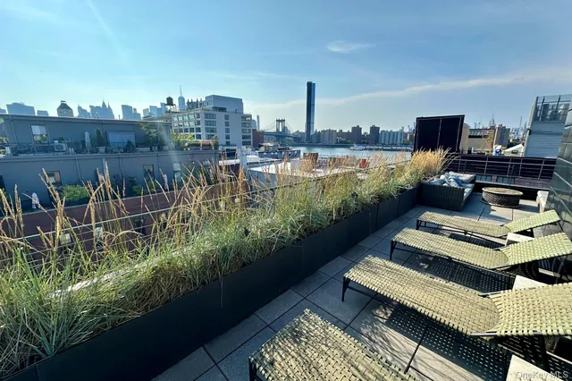 a view of a balcony with chairs