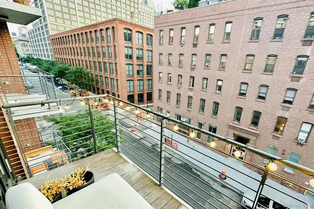 a view of a building from a balcony