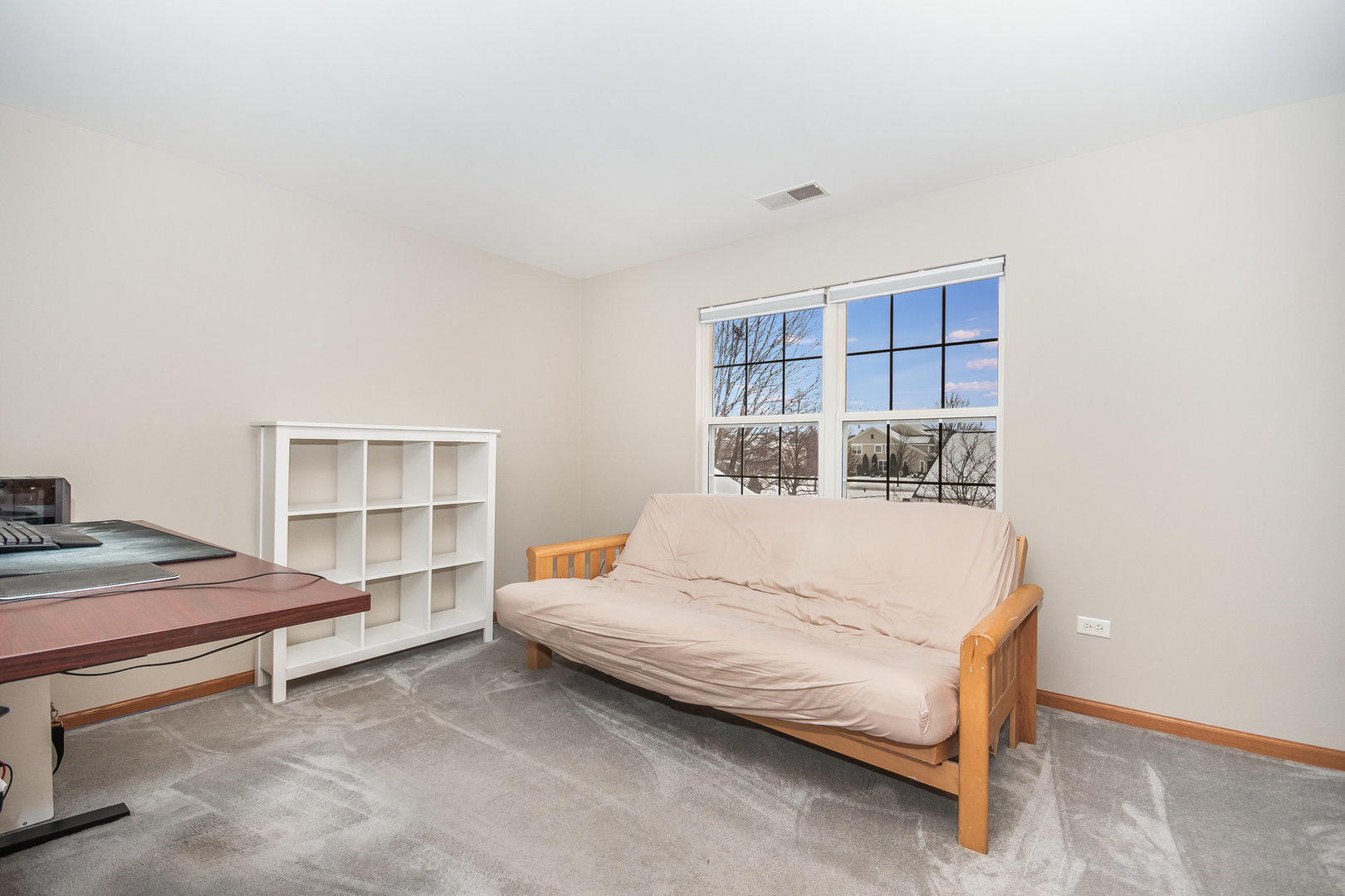 712 Eagle Brook Lane Naperville, IL 60565 - Photo 25 of 40 a bedroom with a bed and a window