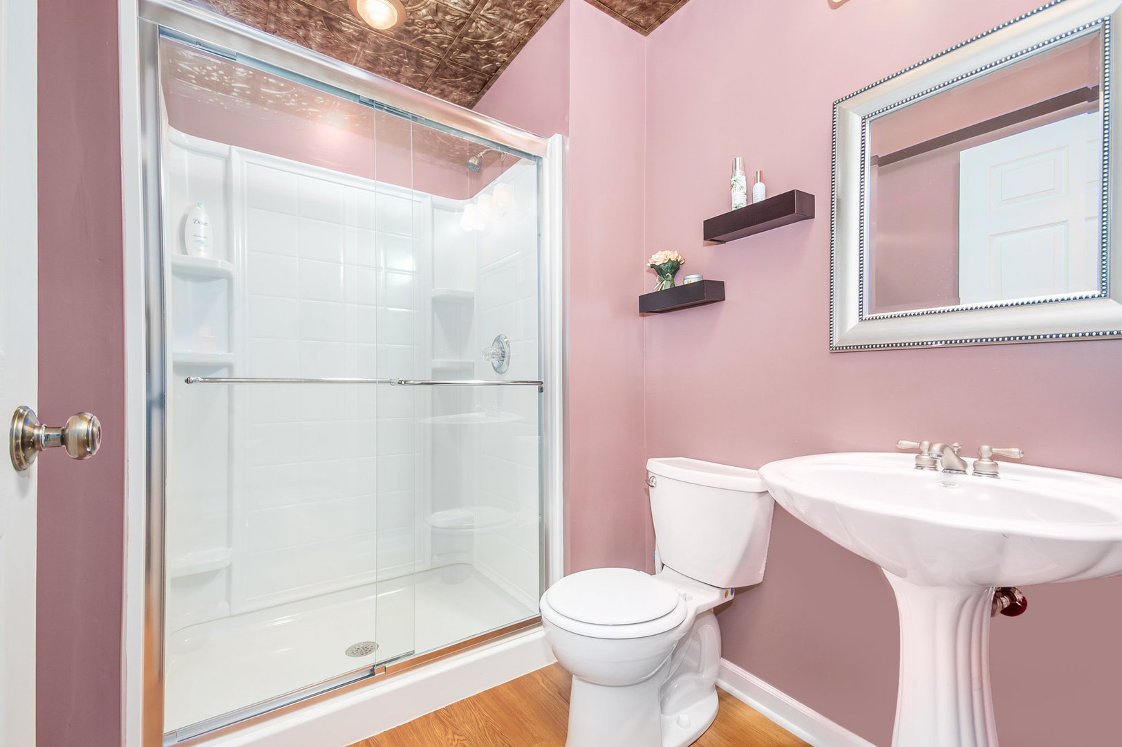 712 Eagle Brook Lane Naperville, IL 60565 - Photo 33 of 40 a bathroom with a sink mirror toilet and shower