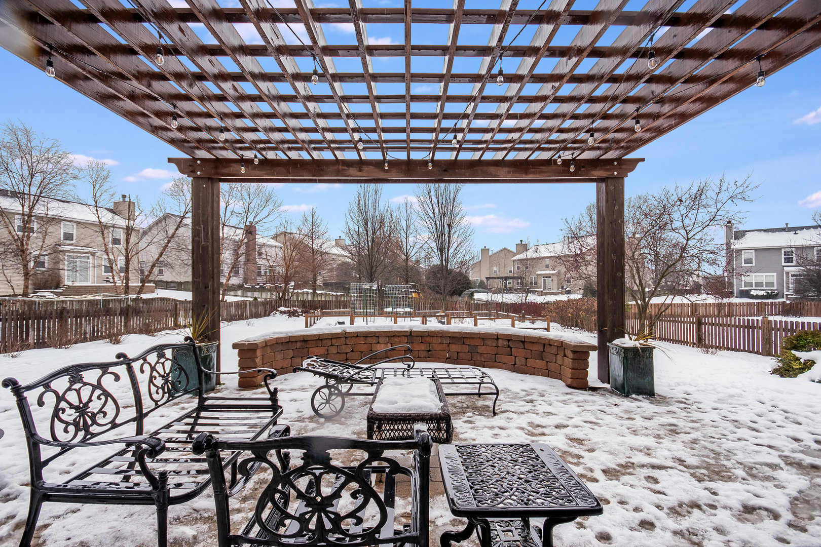 712 Eagle Brook Lane Naperville, IL 60565 - Photo 40 of 40 a view of a patio with a table chairs and a patio