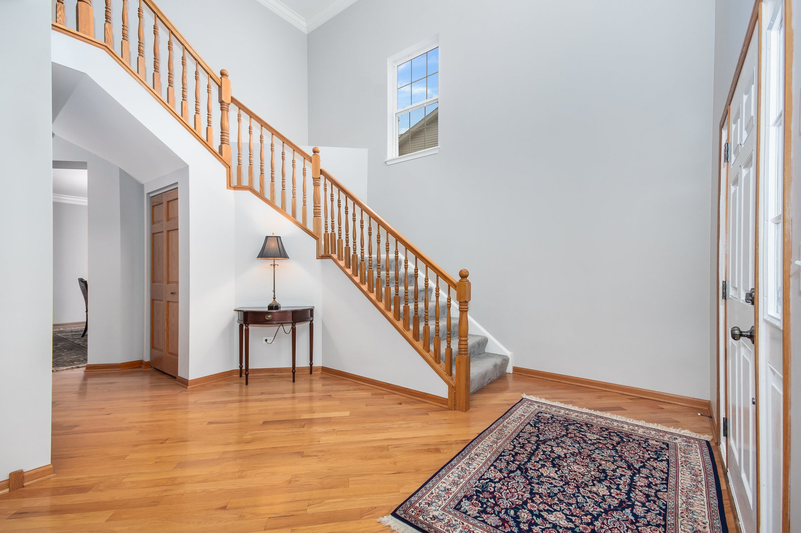 712 Eagle Brook Lane Naperville, IL 60565 - Photo 7 of 40 a view of entryway and hall with wooden floor
