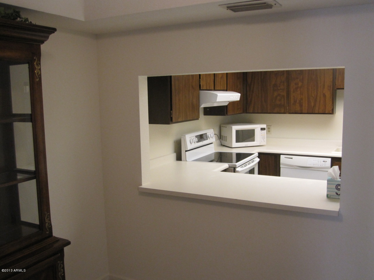202 East Ruth Avenue, Unit 4 Phoenix, AZ 85020 - Photo 12 of 13 Window from Dining Area into Kitchen