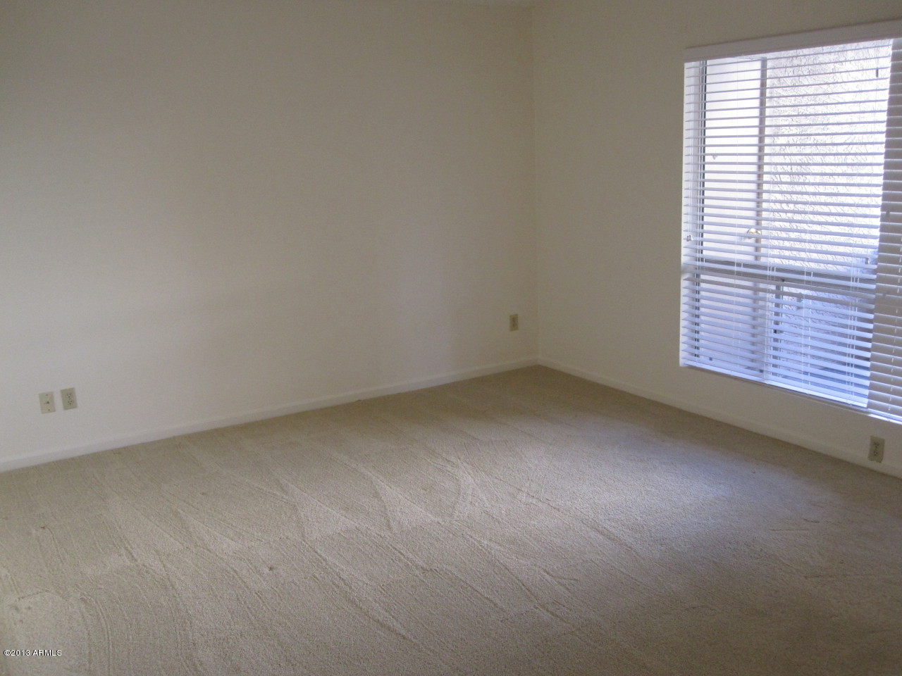 202 East Ruth Avenue, Unit 4 Phoenix, AZ 85020 - Photo 6 of 13 Living Room with Carpet installed in 201