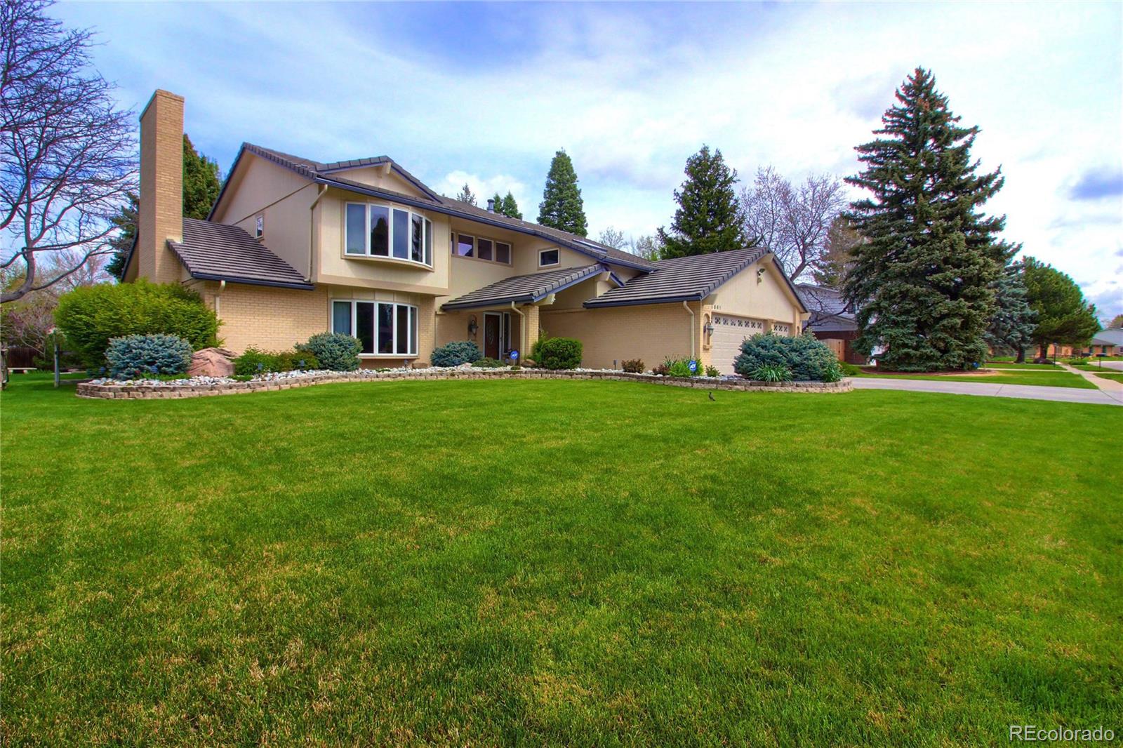 a view of a house with a big yard