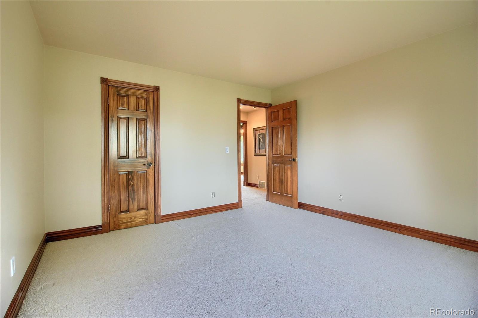 5661 West Lakeridge Road Lakewood, CO 80227 - Photo 25 of 35 a view of an empty room and closet area