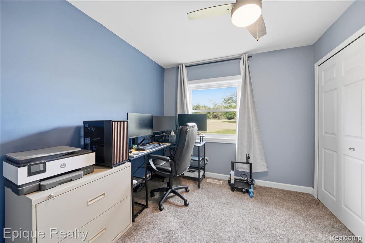 12272 East Mt Morris Road Davison, MI 48423 - Photo 14 of 39 Room featuring light blue walls and a window with white trim
