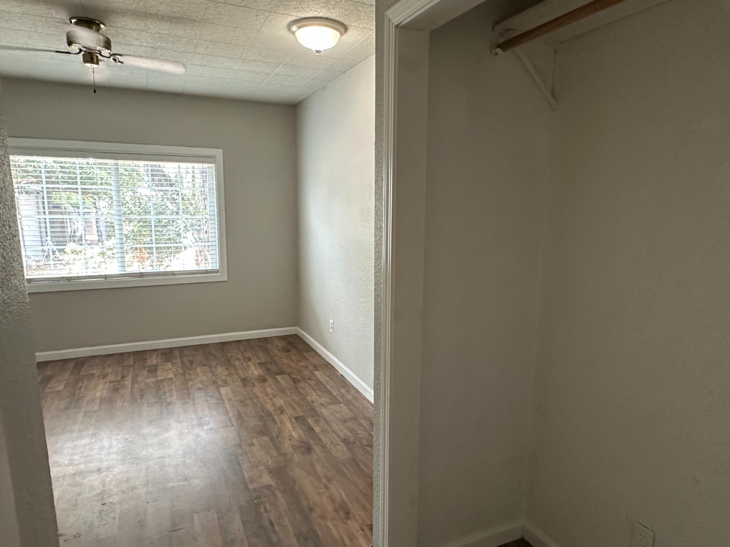 1235 N Street Newman, CA 95360 - Photo 28 of 33 an empty room with a window