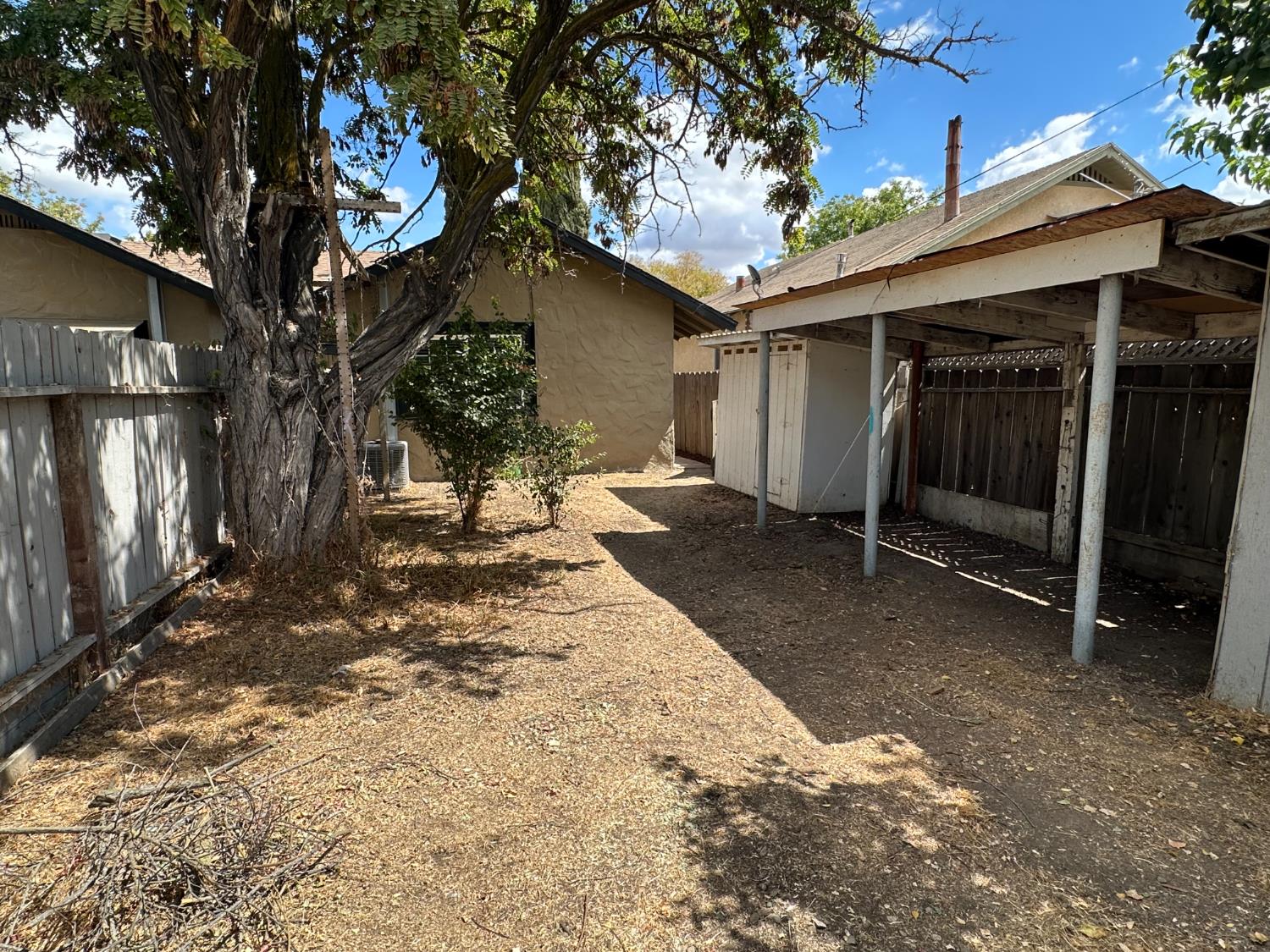 1235 N Street Newman, CA 95360 - Photo 33 of 33 a view of a house with a yard