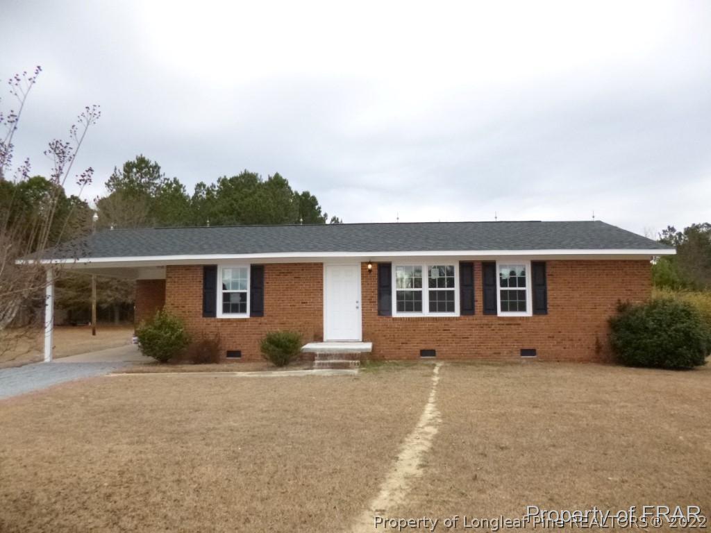 5135 Murphy Road Stedman, NC 28391 - Photo 1 of 33 a house view with backyard space