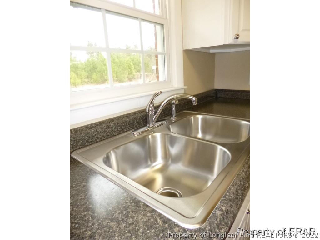 5135 Murphy Road Stedman, NC 28391 - Photo 13 of 33 a close view of sink and tap
