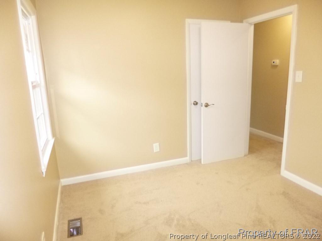5135 Murphy Road Stedman, NC 28391 - Photo 17 of 33 a view of an empty room