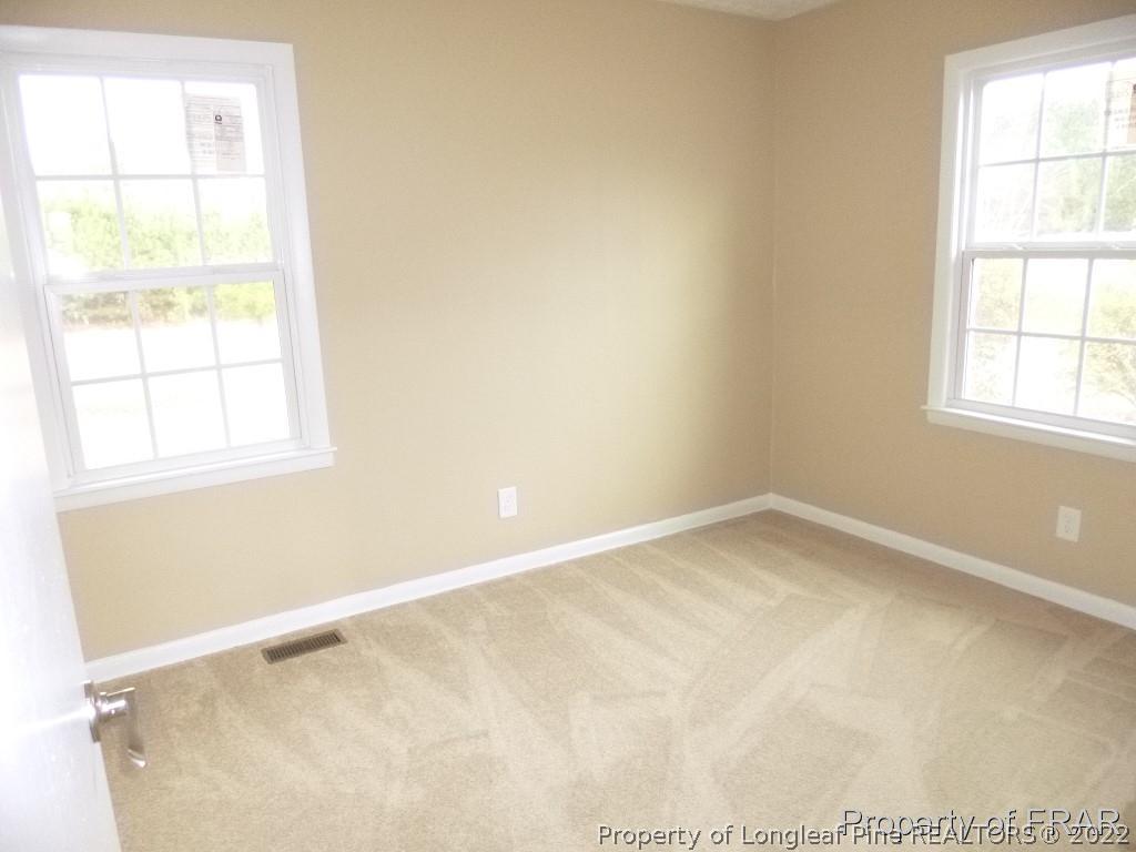 5135 Murphy Road Stedman, NC 28391 - Photo 19 of 33 an empty room with a window