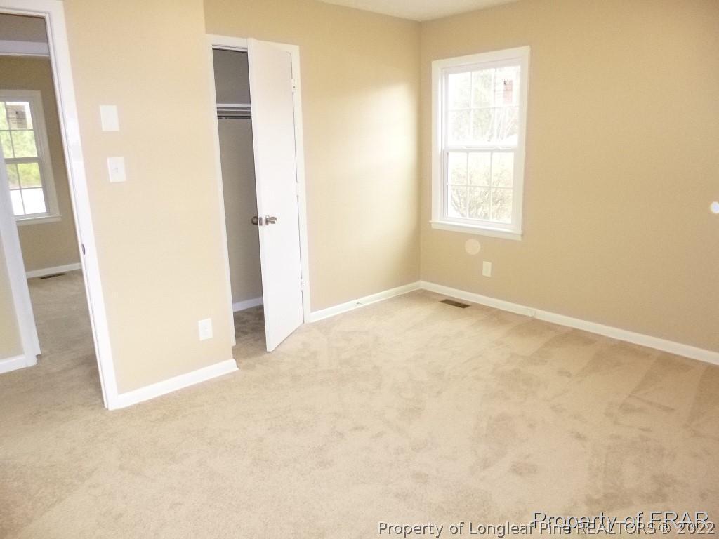 5135 Murphy Road Stedman, NC 28391 - Photo 21 of 33 an empty room with windows