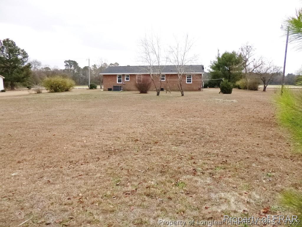 5135 Murphy Road Stedman, NC 28391 - Photo 30 of 33 a view of house with outdoor space