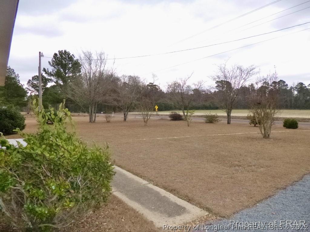5135 Murphy Road Stedman, NC 28391 - Photo 31 of 33 a view of lake with outdoor space