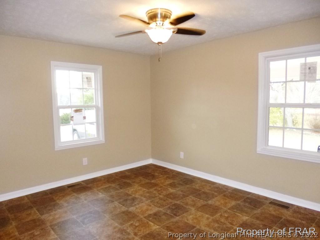 5135 Murphy Road Stedman, NC 28391 - Photo 7 of 33 a view of an empty room with a window