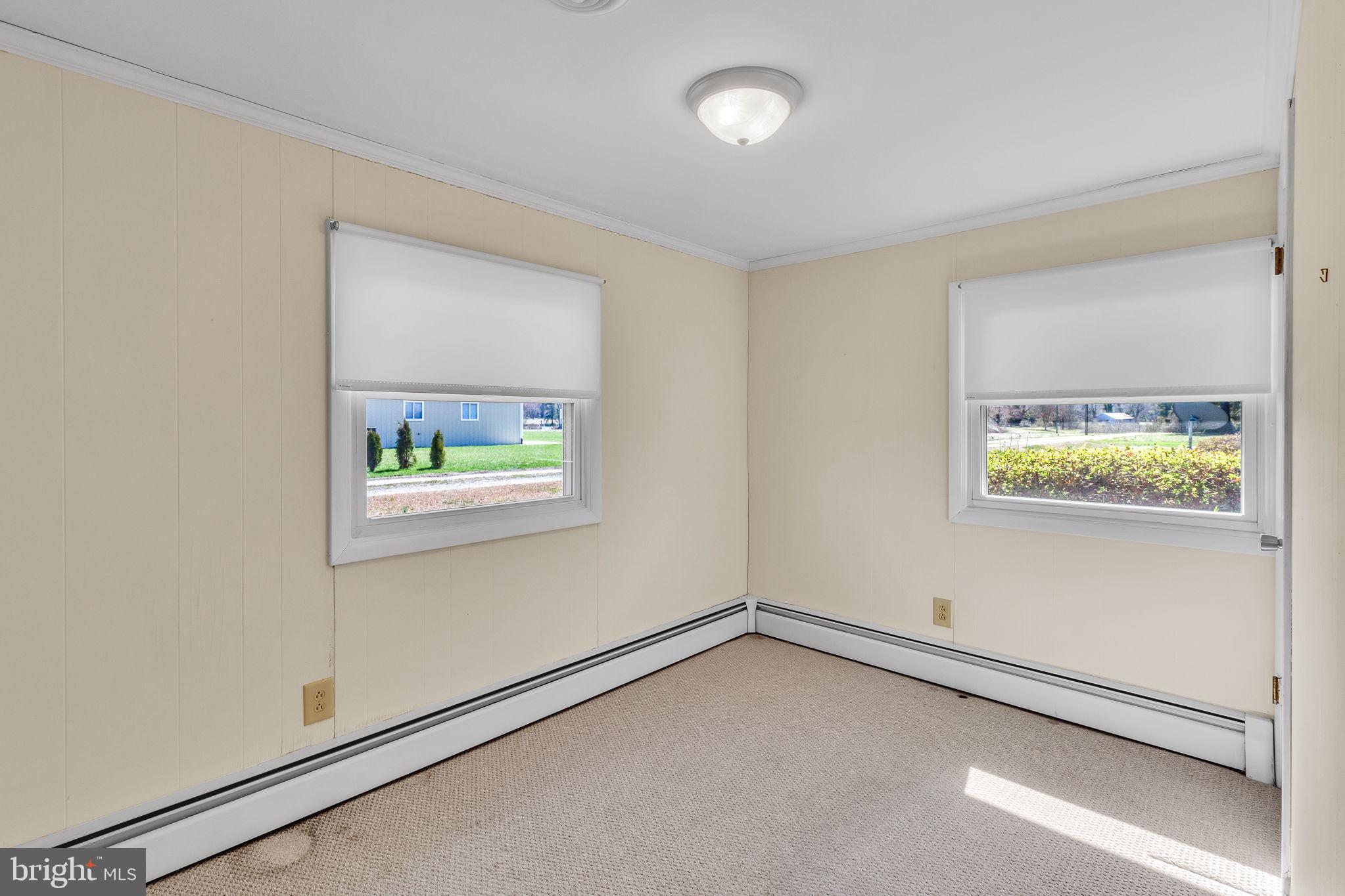 305 Colieville Lane Reedville, VA 22539 - Photo 19 of 49 Bright and airy corner room retreat.