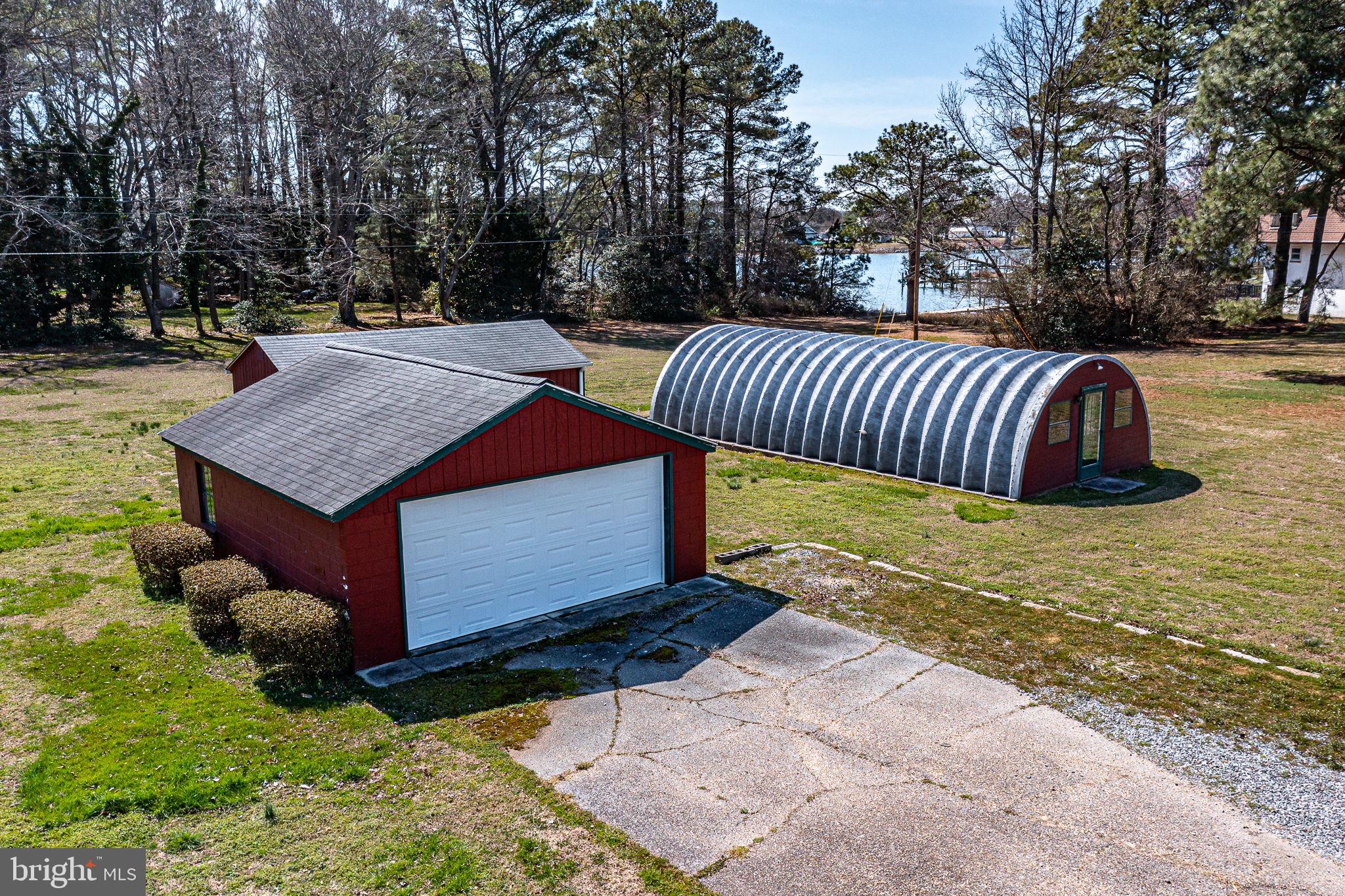 305 Colieville Lane Reedville, VA 22539 - Photo 37 of 49 Charming red outbuilding on spacious lot.