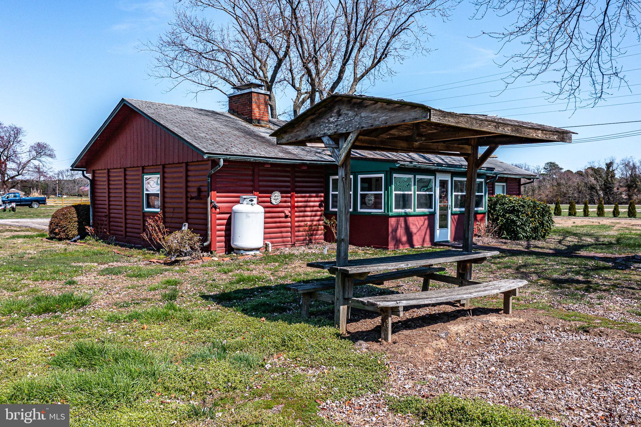 305 Colieville Lane Reedville, VA 22539 - Photo 38 of 49 Charming red cottage with rustic charm.